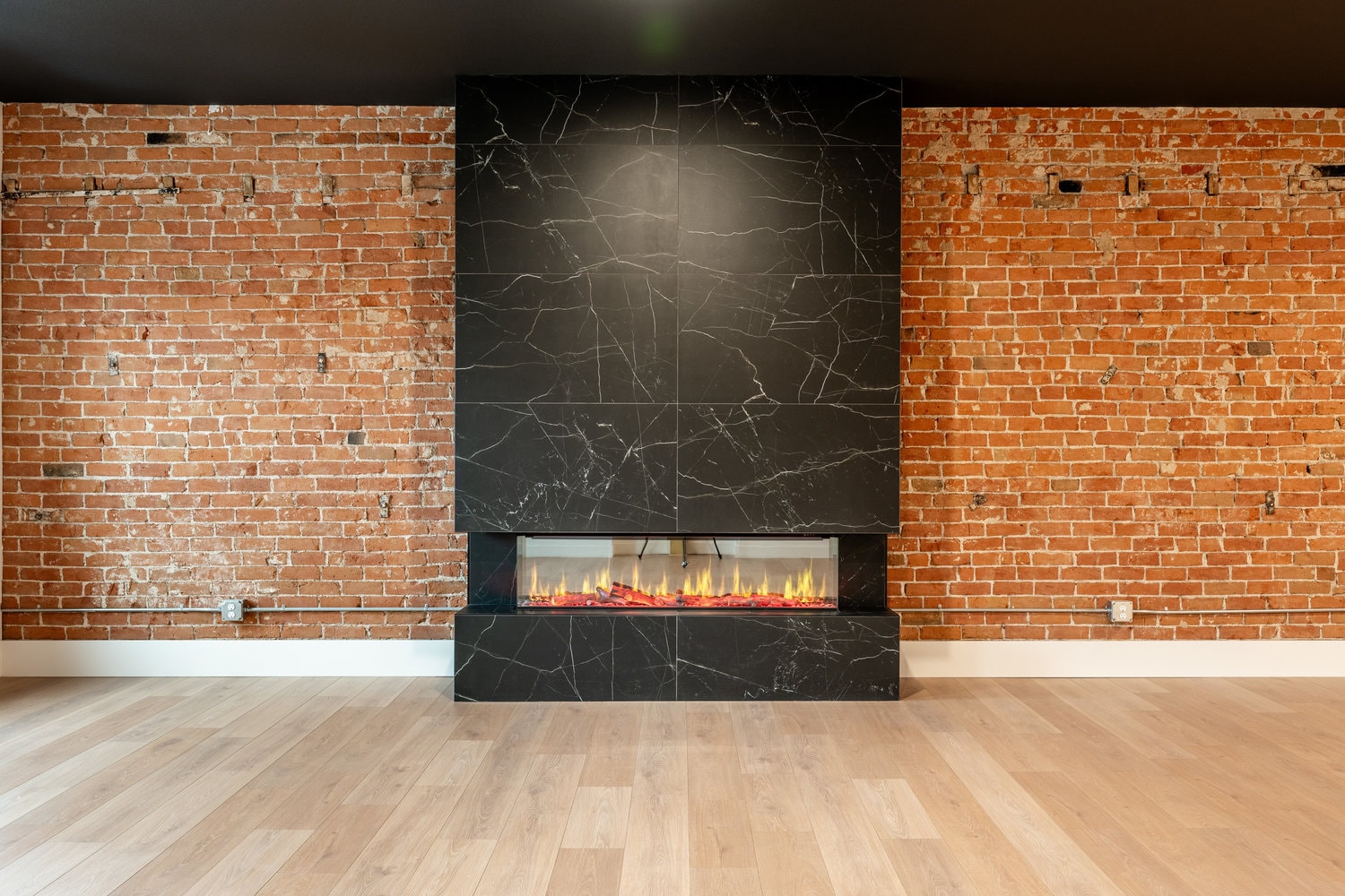 The Onyx luxury suite Fireplace — The Main Exchange Sheridan WY